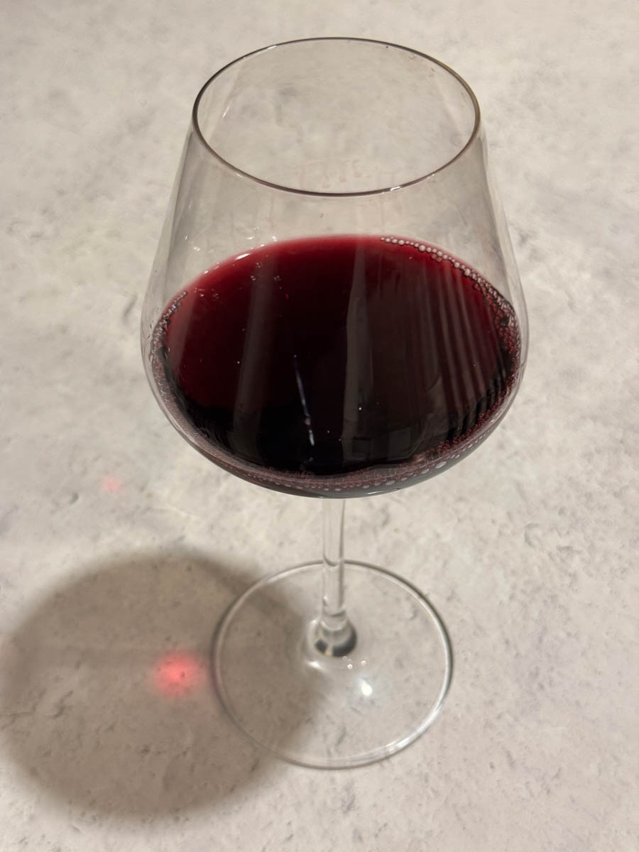 a glass of wine on the table