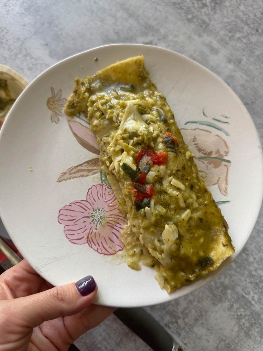 green enchiladas on the plate
