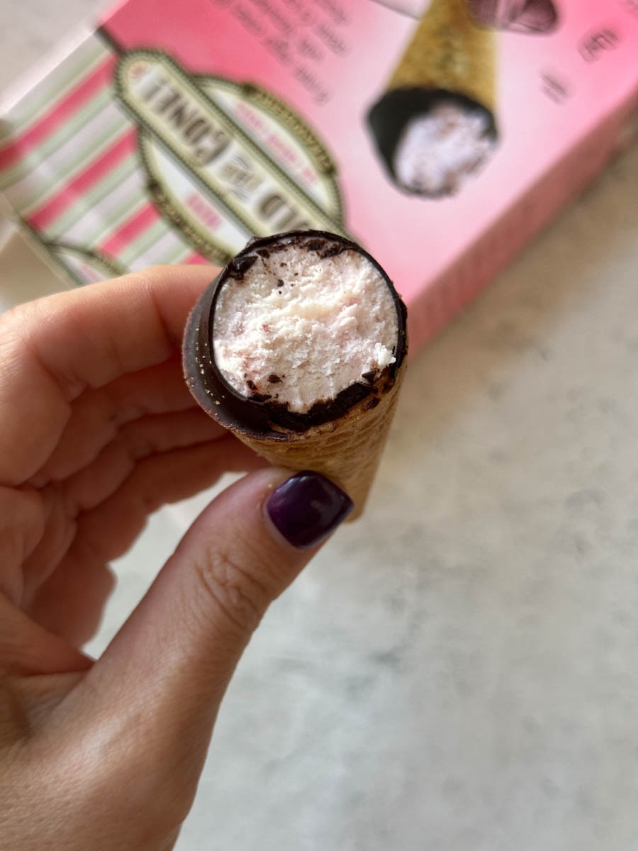 mini ice cream cone in hand