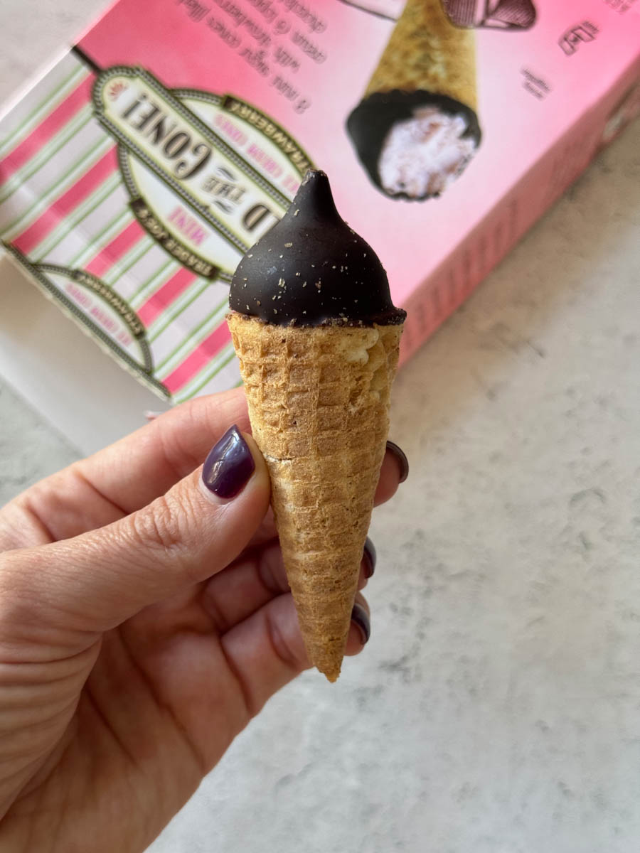 holding a mini ice cream cone