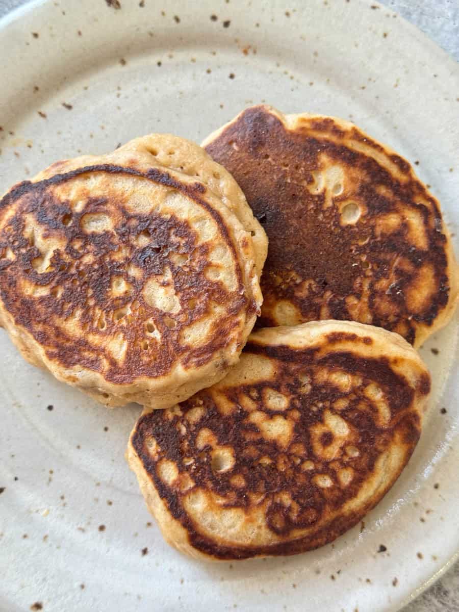three large pancakes on the plate