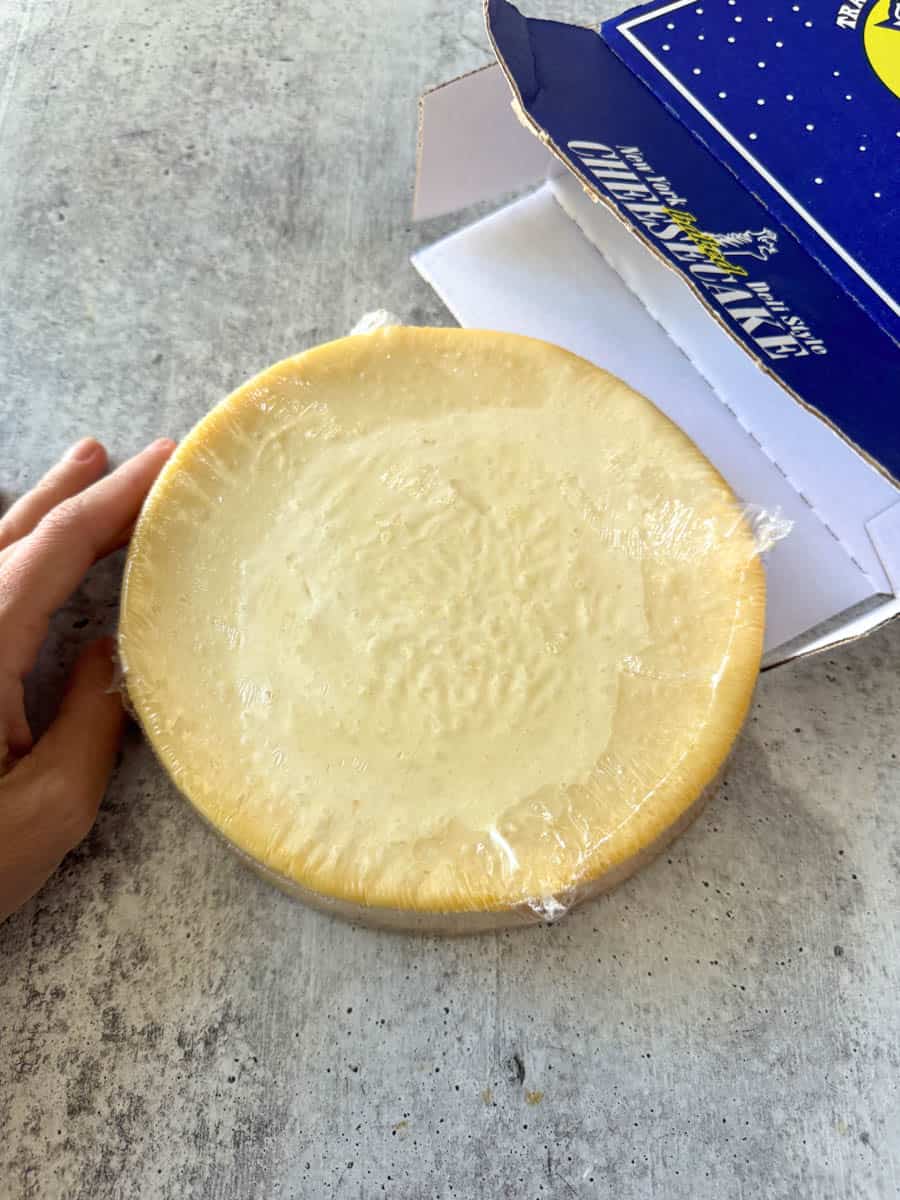 cheesecake on the table covered in plastic
