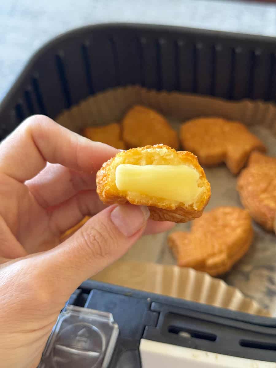 custard filled waffle in hand