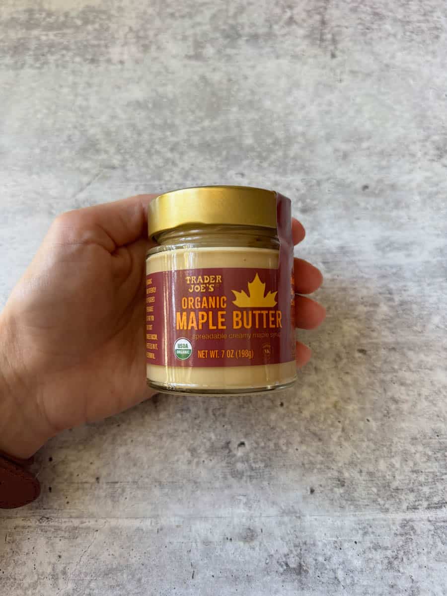 trader joe's organic maple butter jar in hand