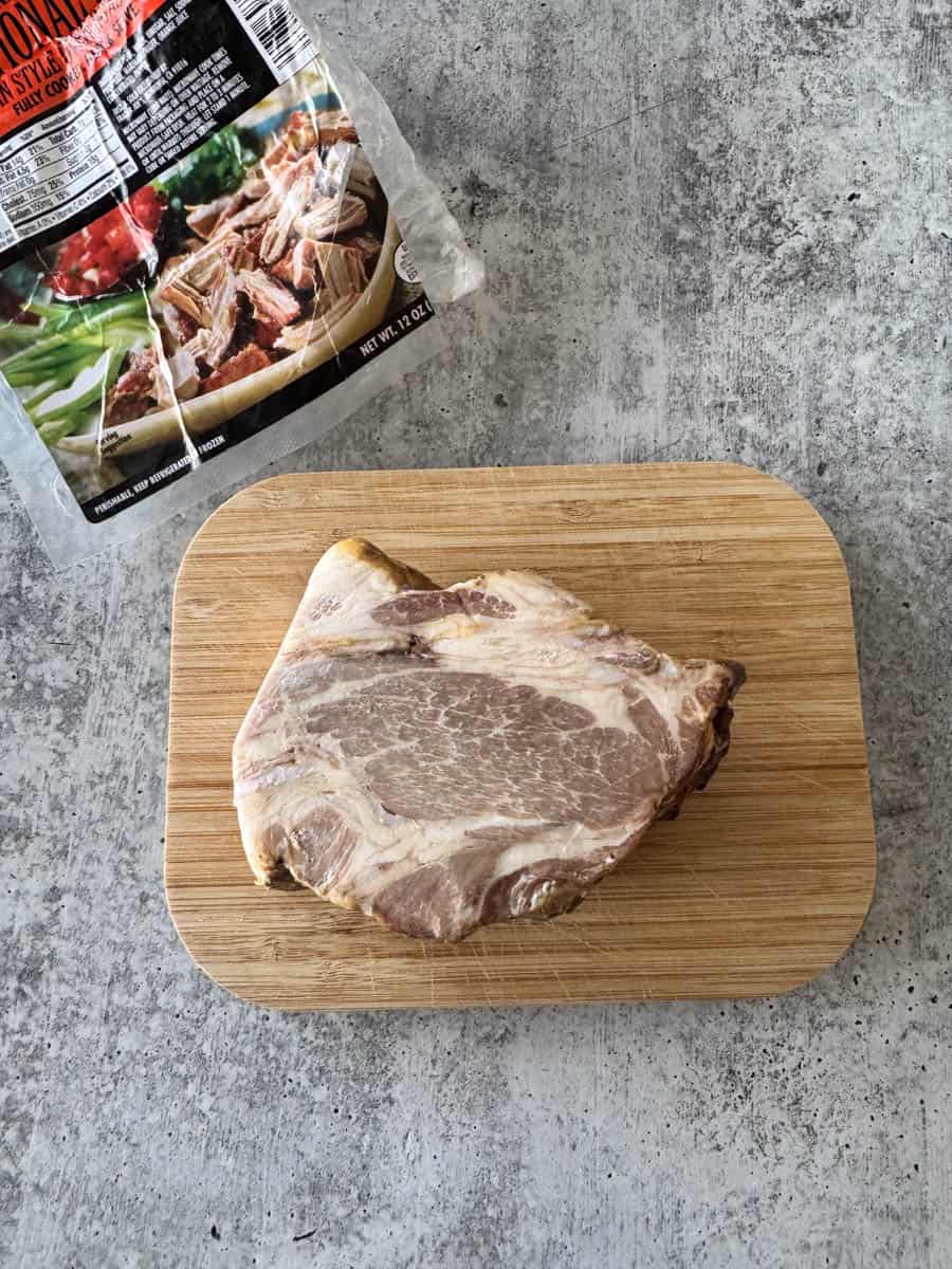 a solid piece of pork on the cutting board