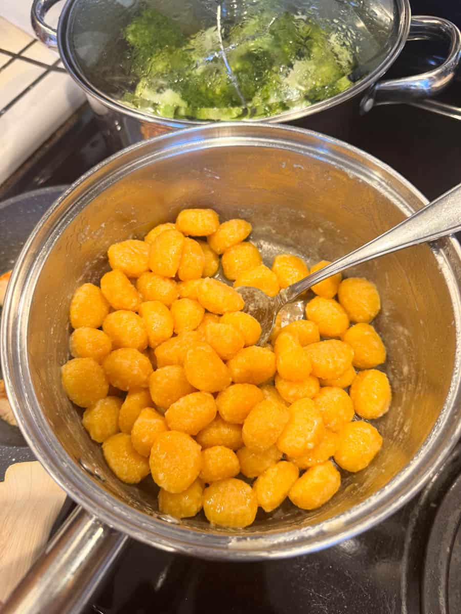 cooked pumpkin gnocchi in the pot