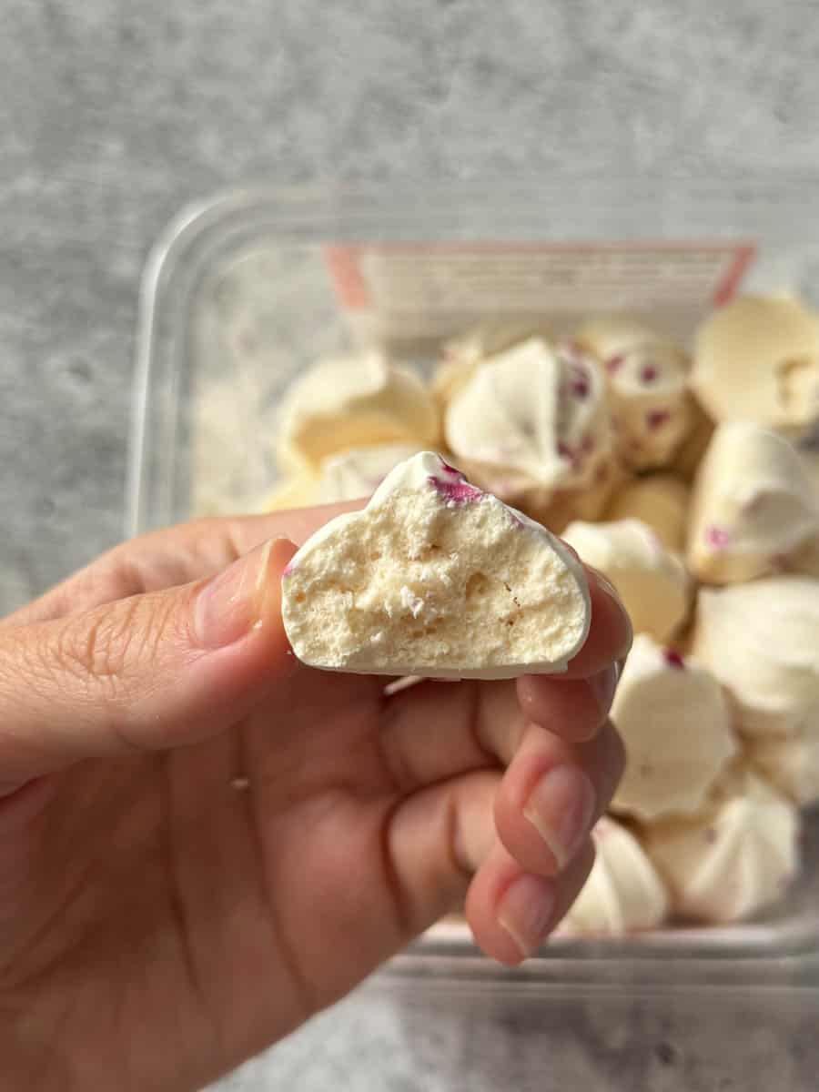 took a bite of a mini meringue