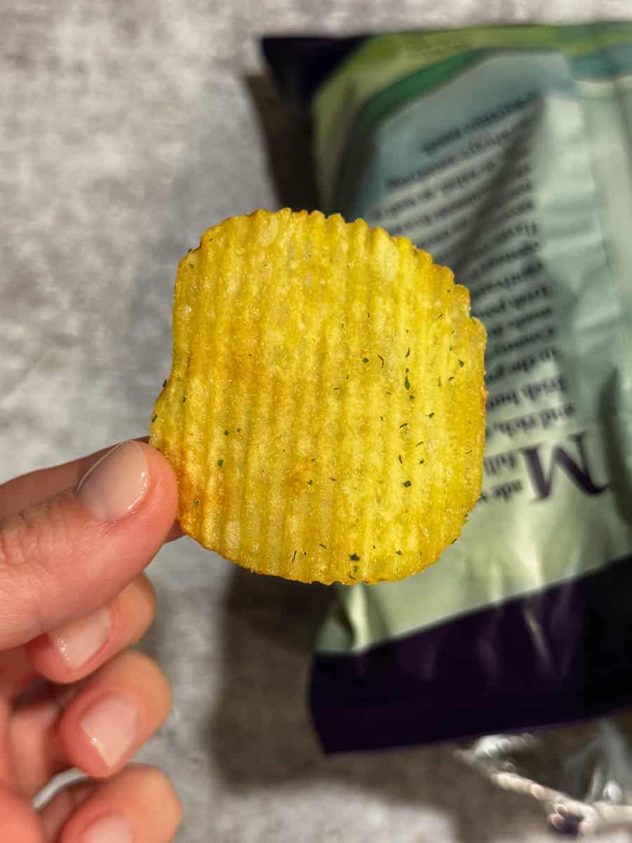 holding chip in hand