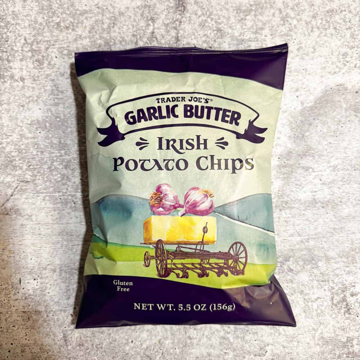 garlic butter Irish potato ships bag on the table