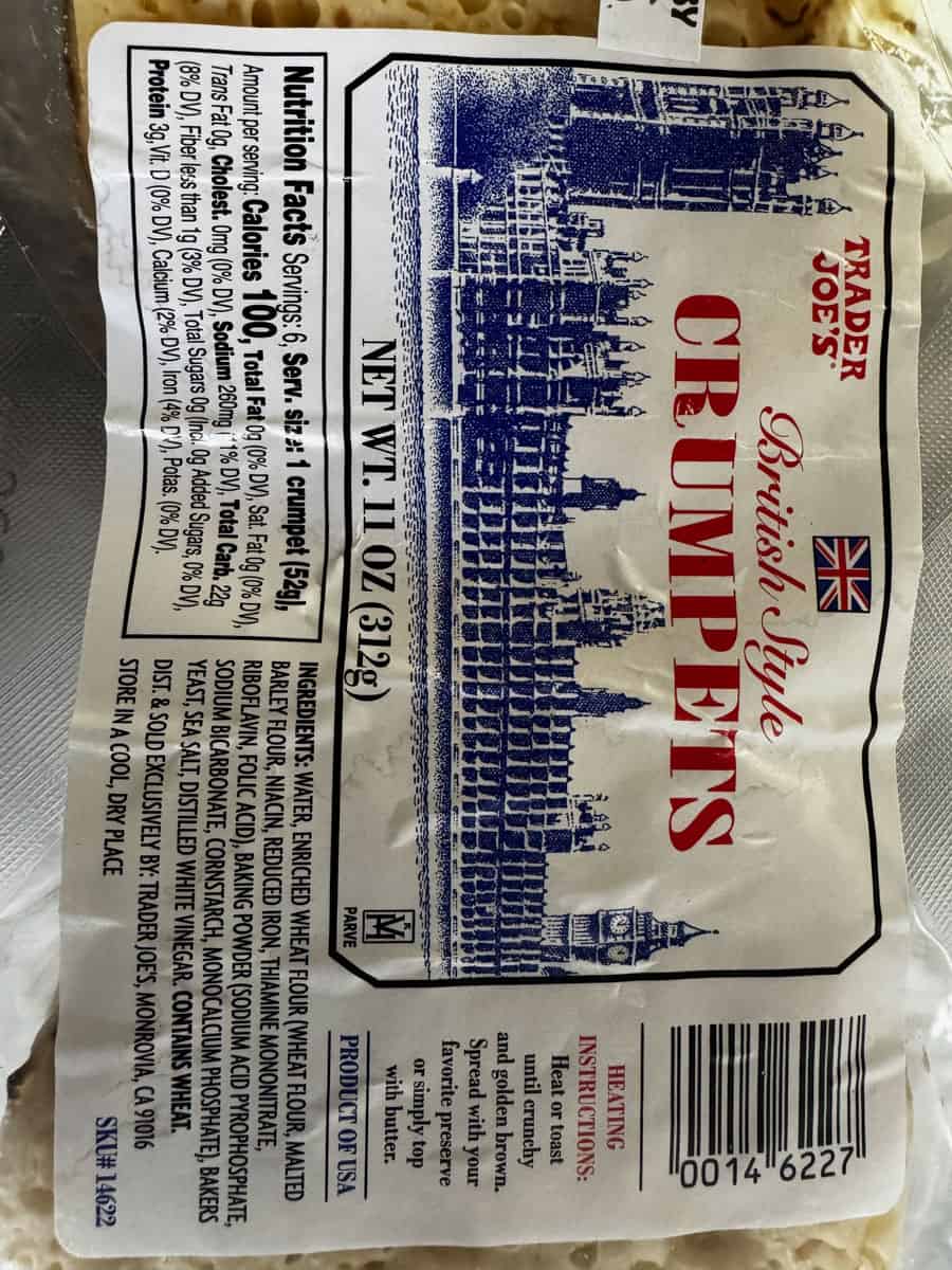 Bread buns packaging with city skyline illustration.