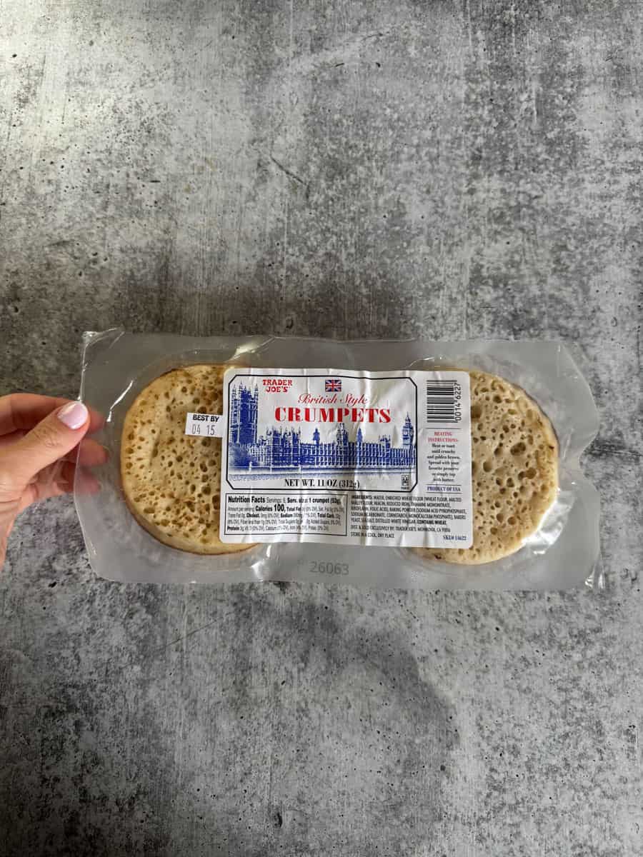 Packaged Trader Eats crumpets on a gray surface, ready for breakfast or snack.