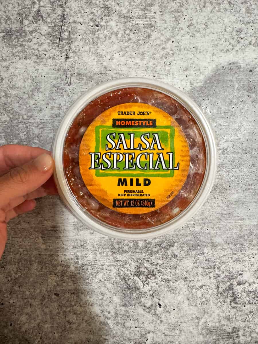 Container of Trader Joe's Salsa Especial Mild, perfect for dipping and adding flavor.