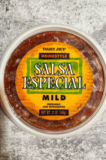 Trader Joe's Salsa Especial Homestyle in a clear container, ready for dipping or cooking.