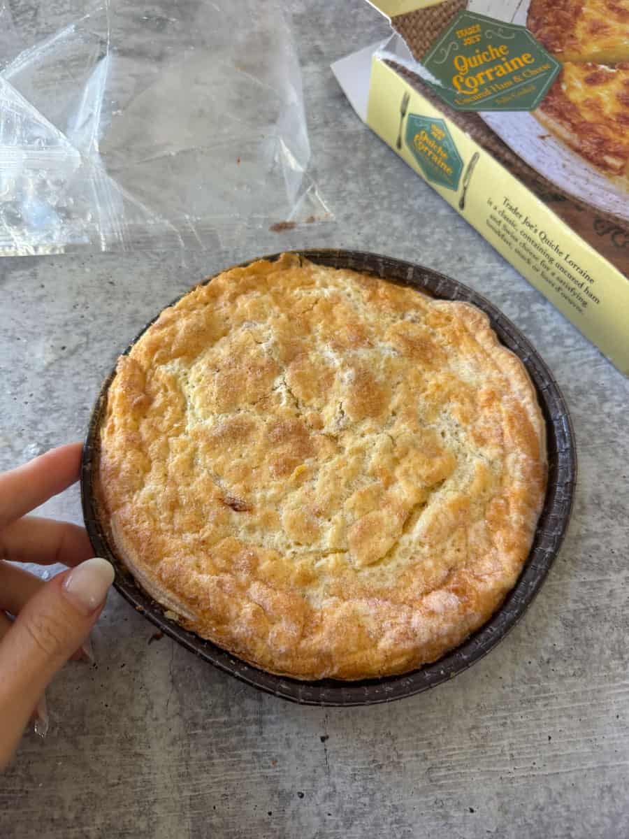 Delicious homemade Quiche Lorraine with golden crust and creamy filling, perfect for breakfast or br.