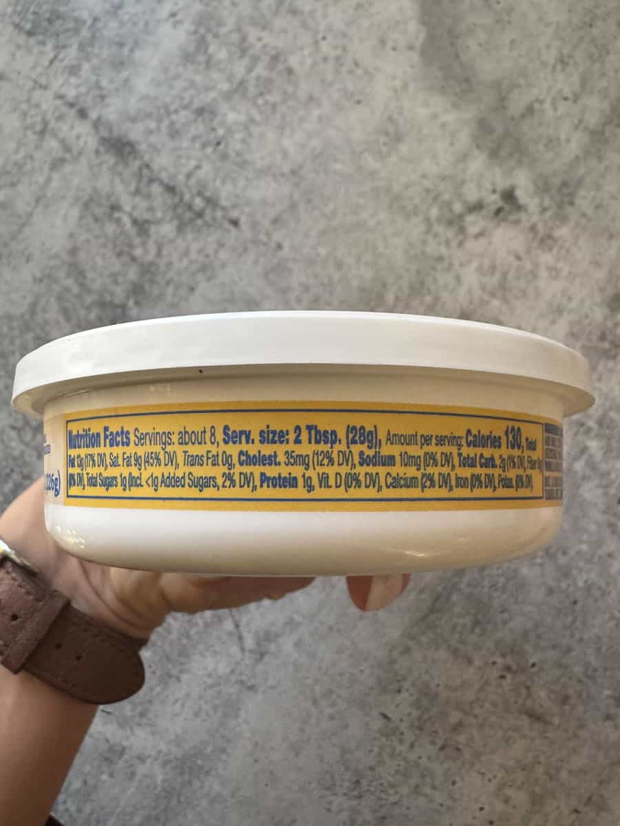 Close-up of a container of Trader Eats healthy dip with nutritional info visible.